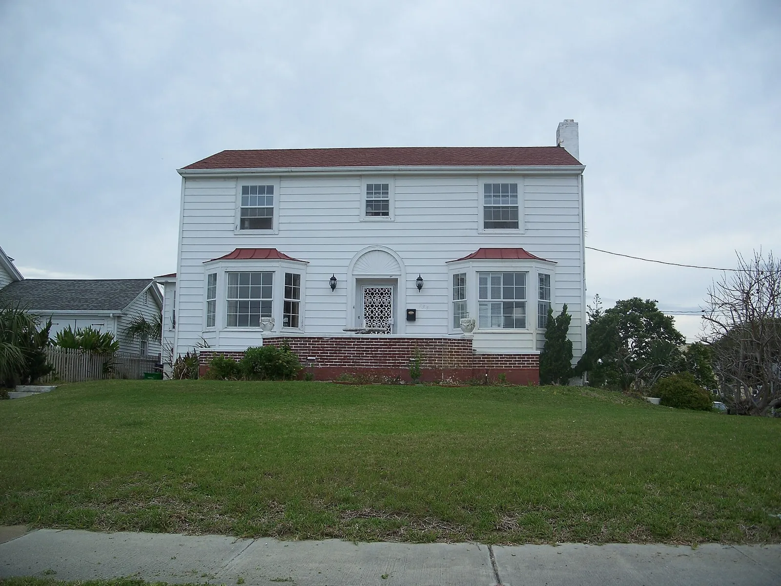 A two-story frame house in the Seabreeze Historic District on the beachside of Daytona Beach.