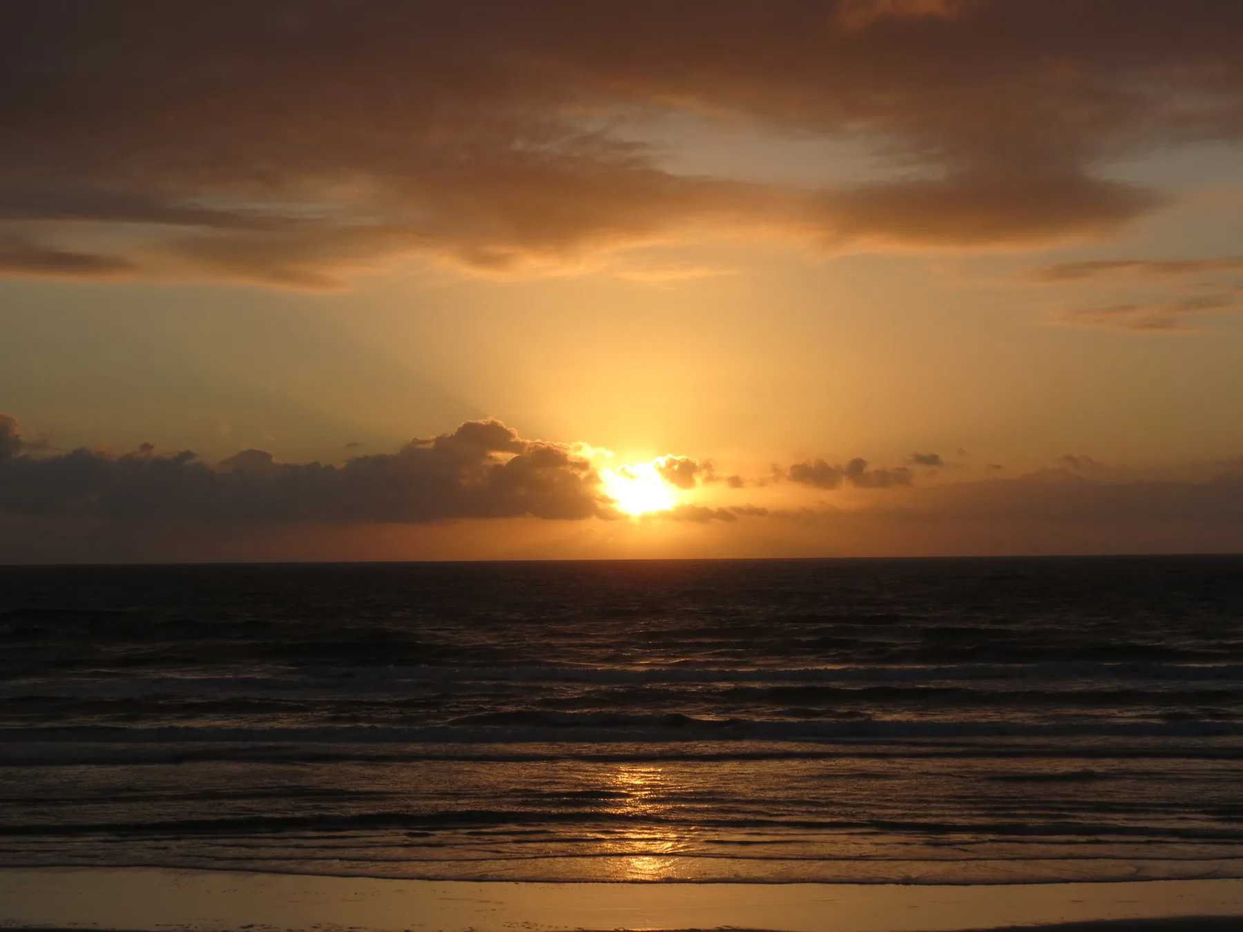 Sunrise over the Atlantic Ocean from the beach at Daytona Beach.