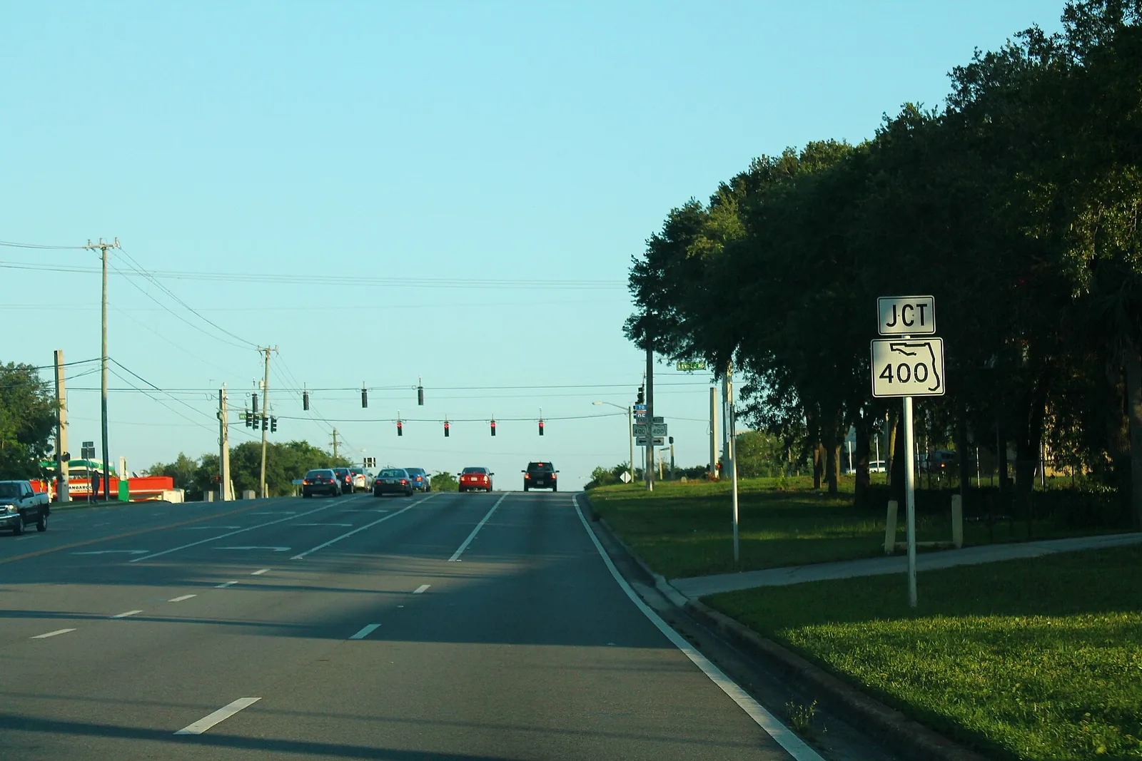 Southbound Clyde Morris Boulevard (State Road 483) approaching its junction with Beville Road (State Road 400).