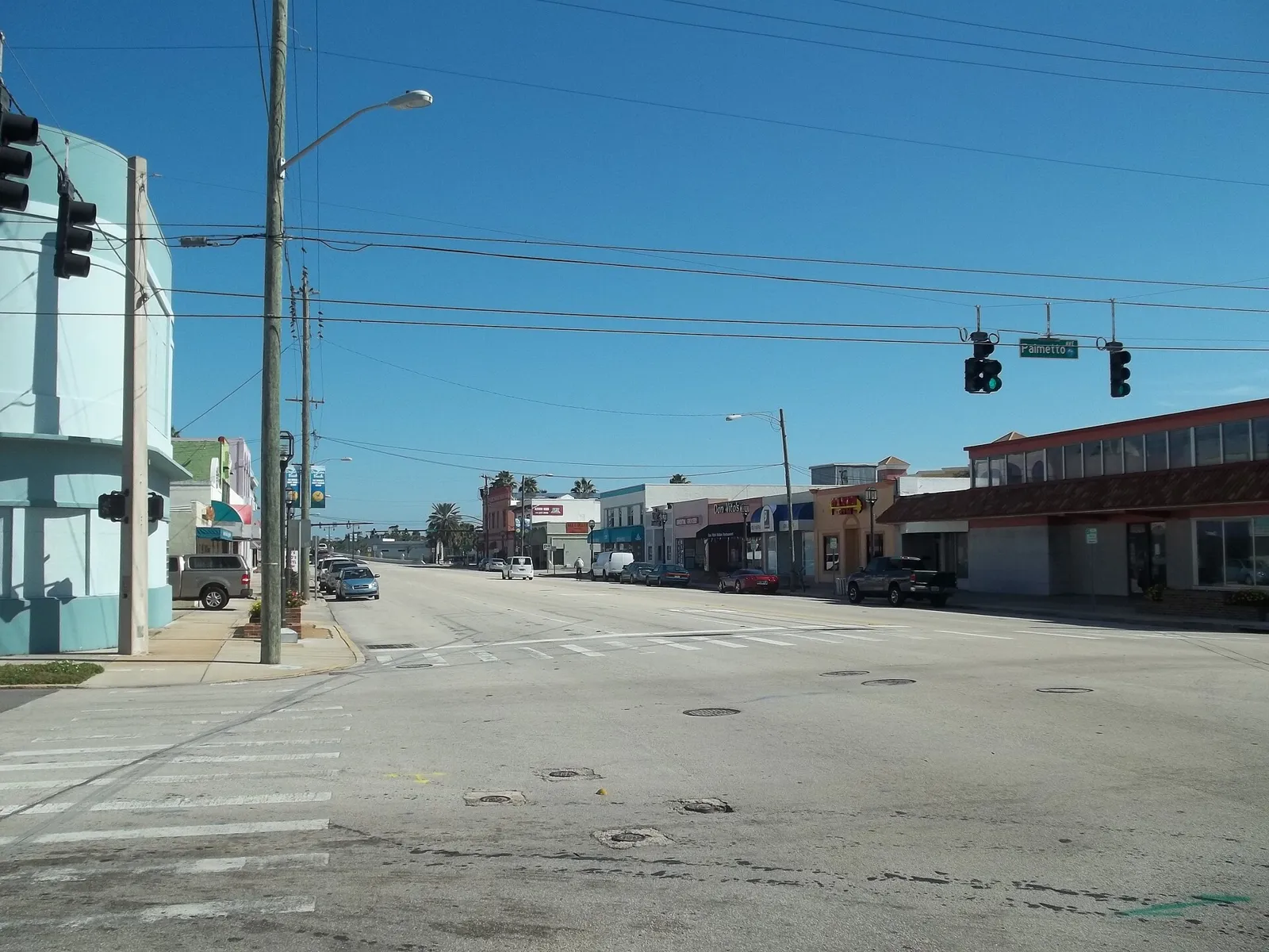 Power lines and traffic signals over Beach Street at Palmetto Avenue in downtown Daytona Beach.