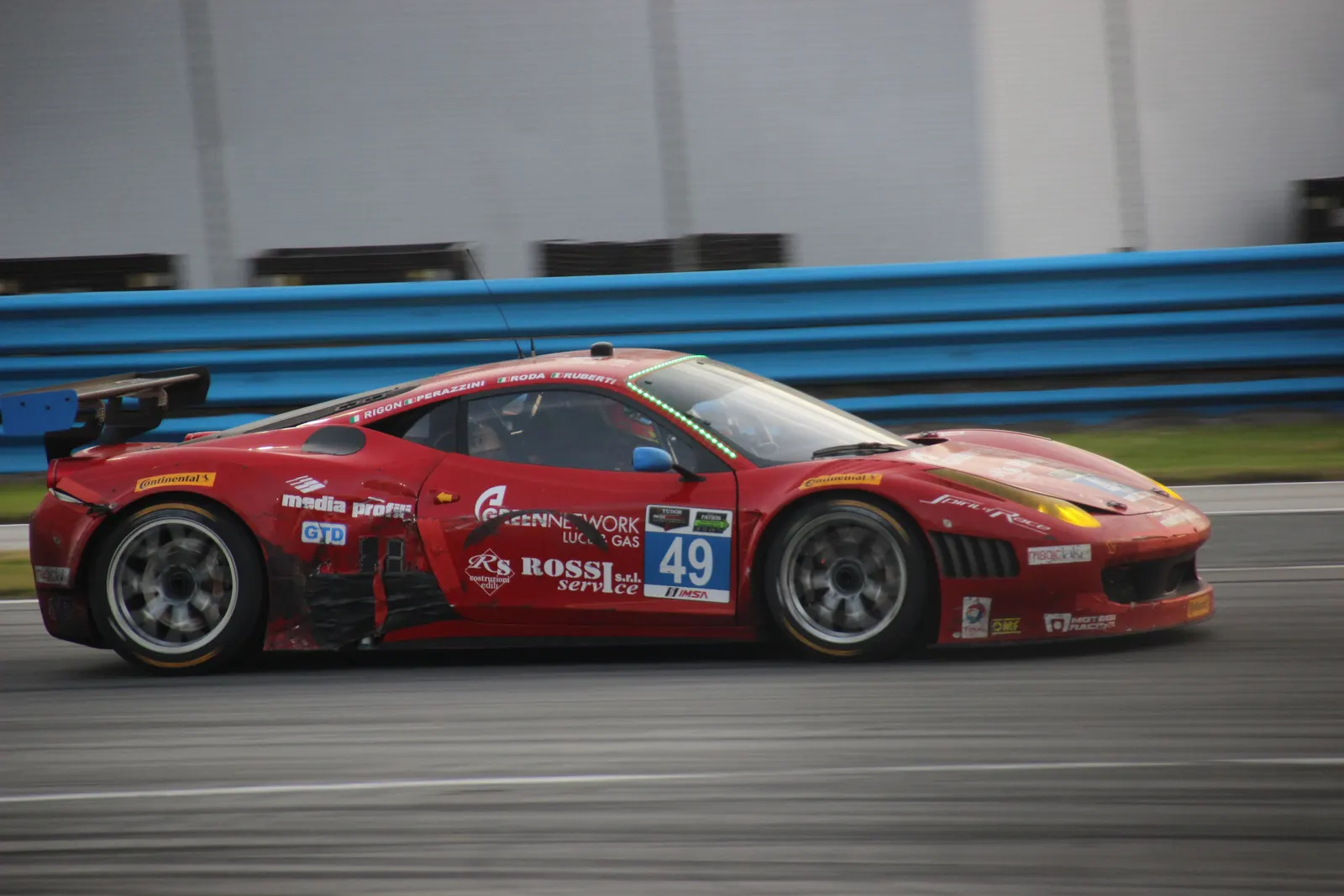 A GT sports car on track at Daytona International Speedway during the Rolex 24 At Daytona.