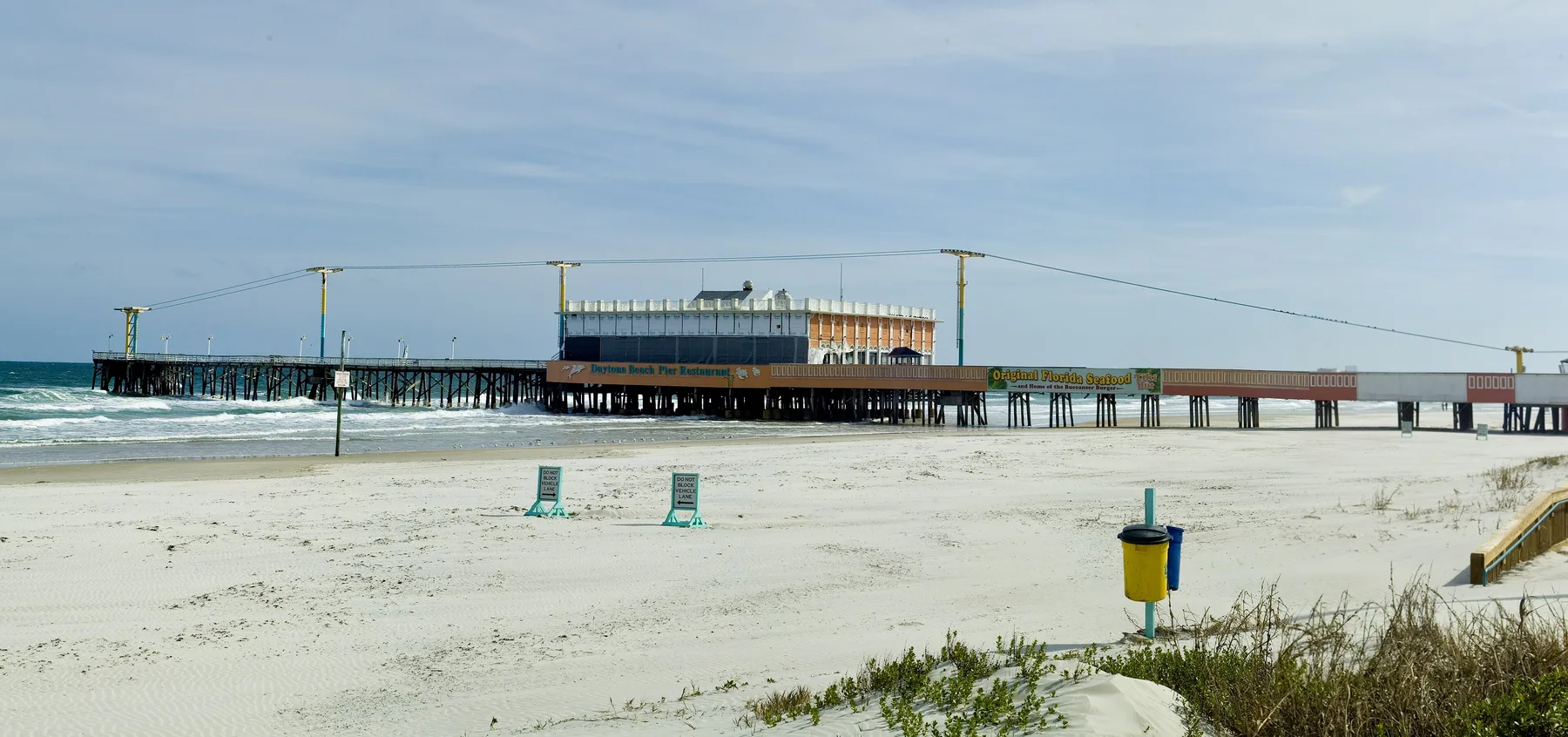 The Daytona Beach Pier and the beach beside the Boardwalk.