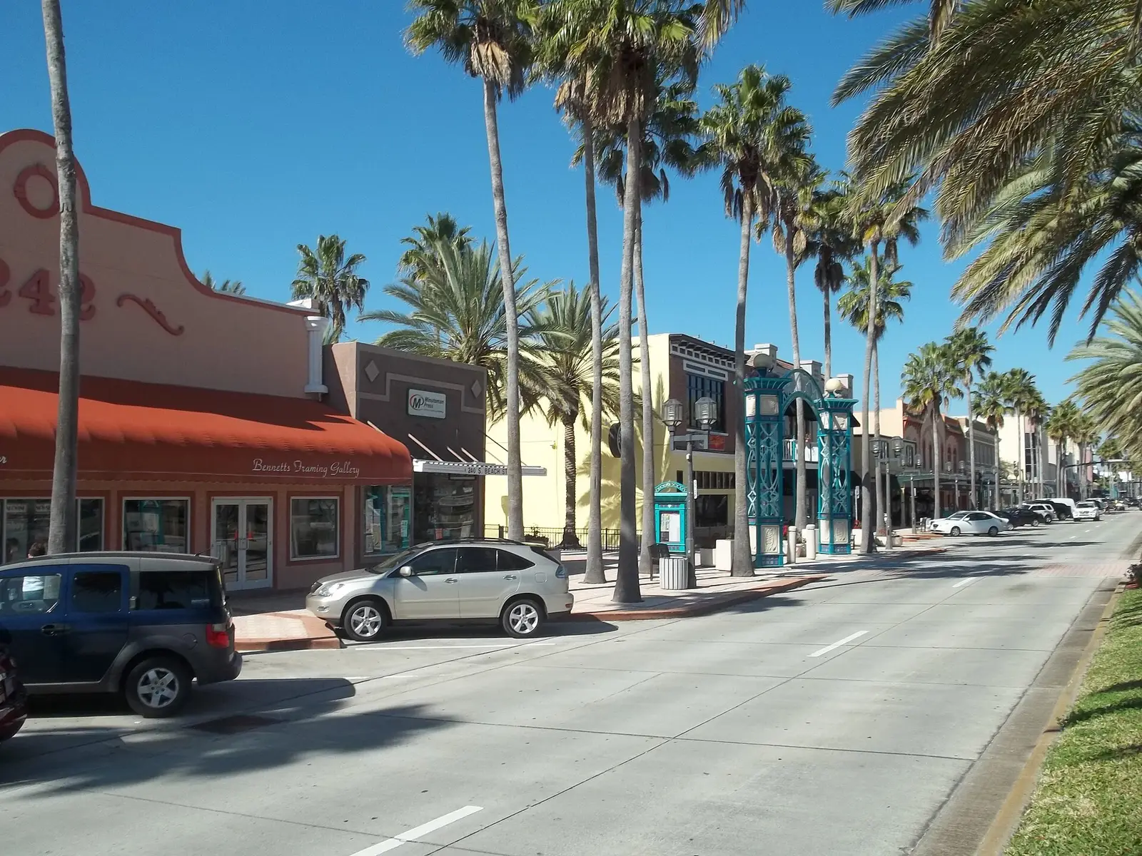 Palm-lined Beach Street in the South Beach Street Historic District of downtown Daytona Beach.