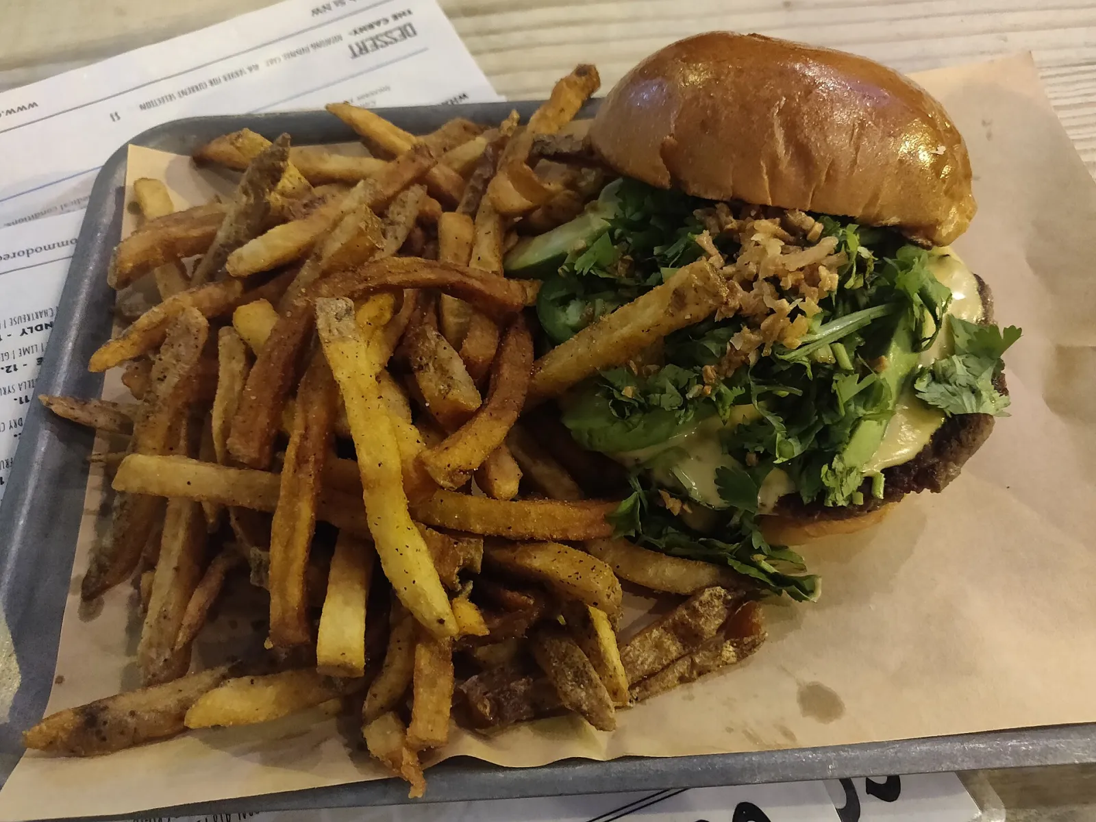 A cheeseburger and fries. The photo was not taken at a Daytona Beach restaurant.